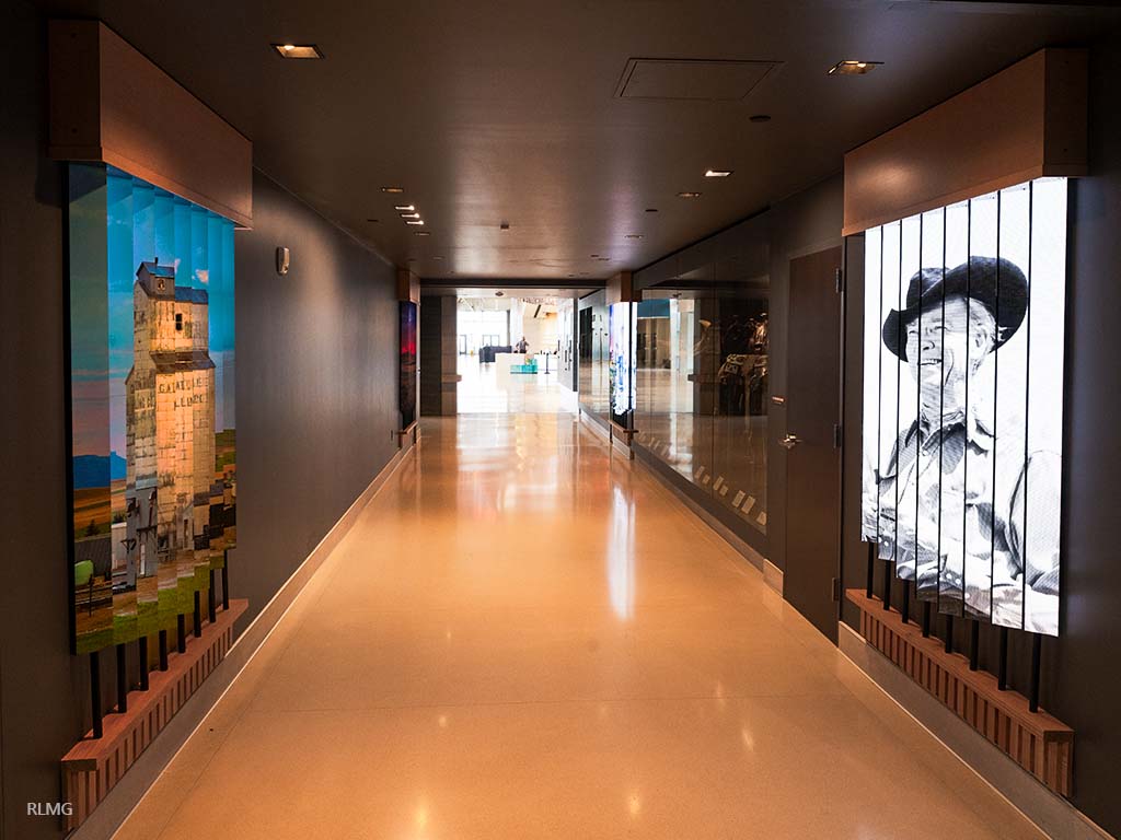 digital art on hallway blade signs
